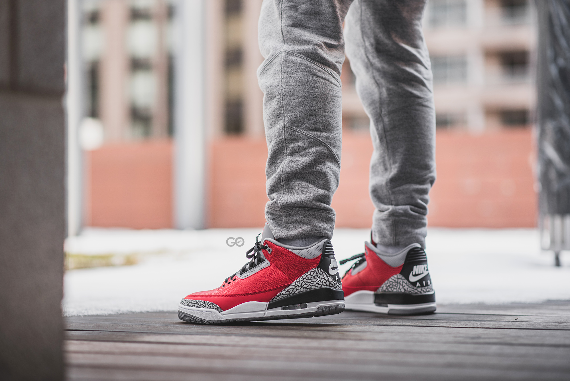 red cement on feet